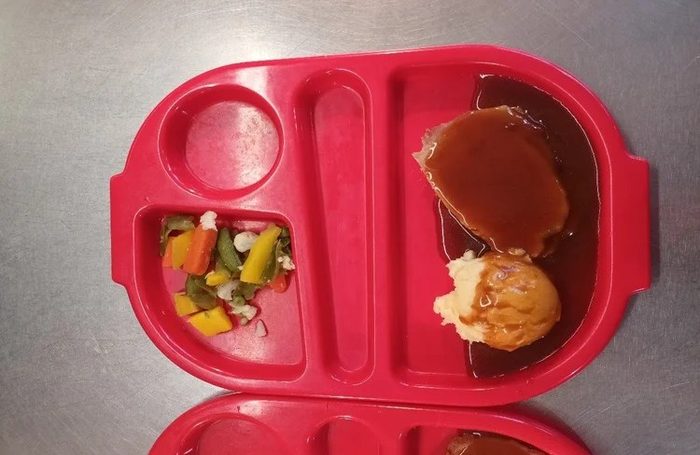 Baked ham, mashed potato, mixed vegetables and gravy